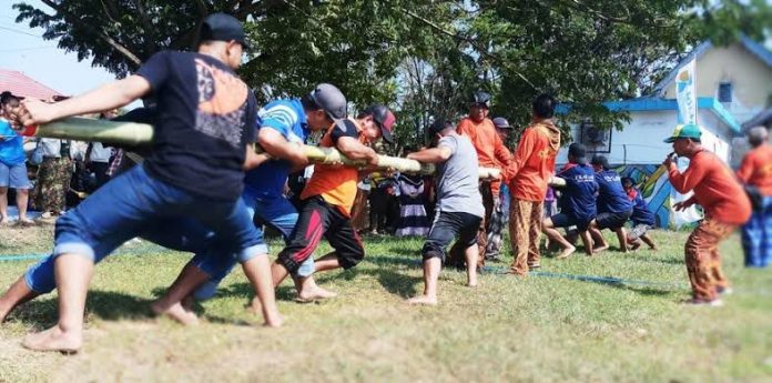 Salah satu lomba olahraga tradisional di Kabupaten Kutai Kartanegara. (Istimewa)