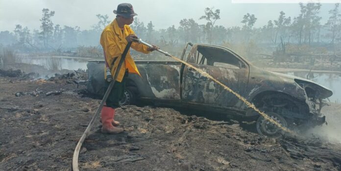 Lokasi kebakaran yang membakar lahan bersama satu unit mobil di Desa Tunjungan, Kecamatan Muara Kaman. (Istimewa)