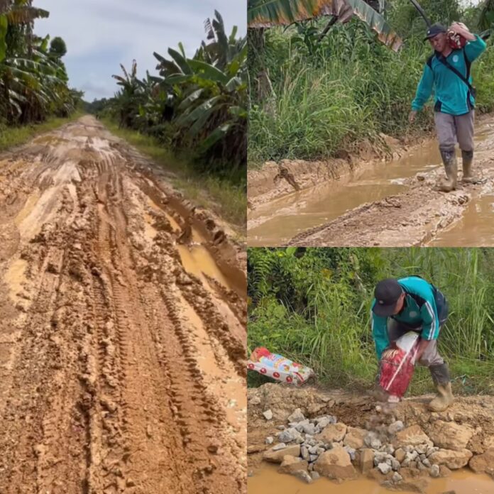 Sekdes Rantau Hempang, Hadir, turun tangan tutup lubang jalan. (Istimewa)